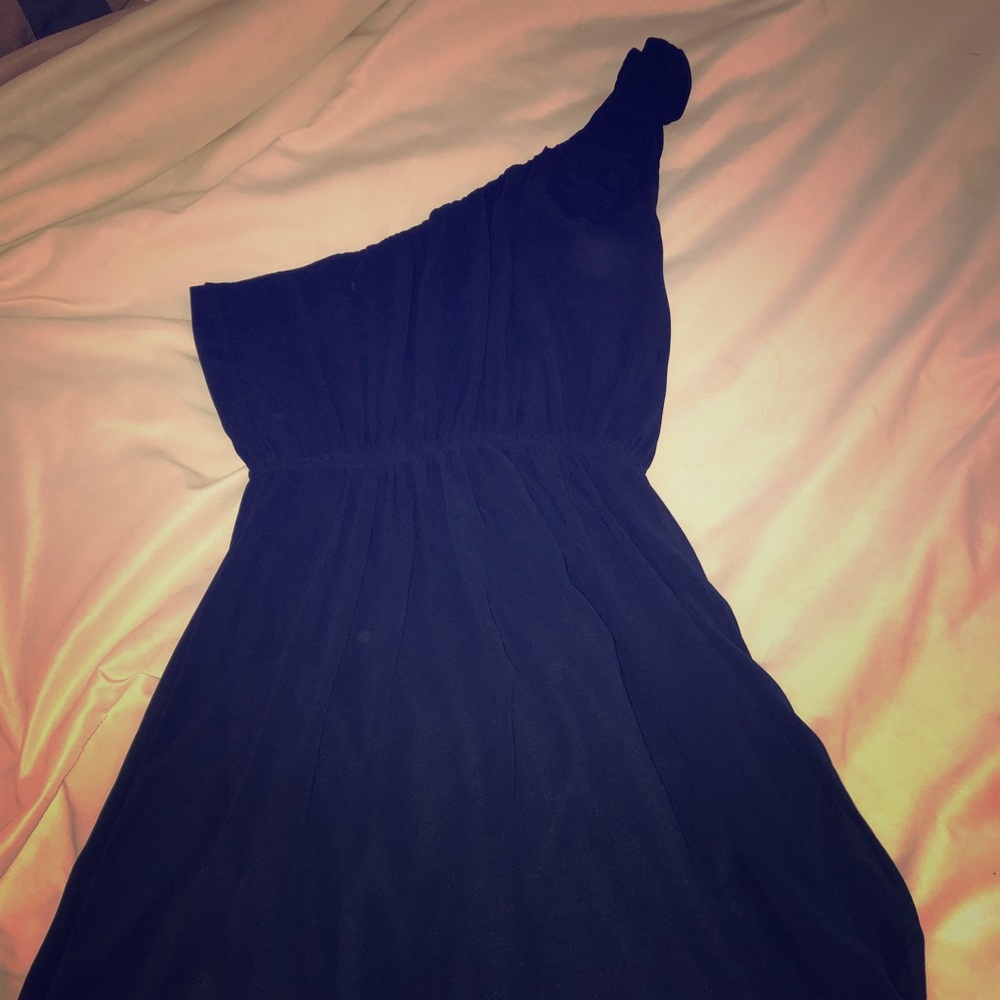 Navy blue flowy knee length dress.